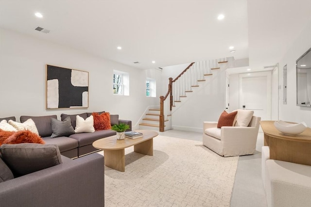 living room featuring light colored carpet