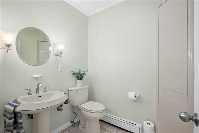 bathroom with tile patterned flooring, toilet, baseboards, a baseboard radiator, and ornamental molding