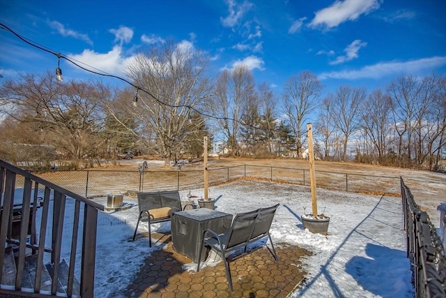 view of snow covered patio