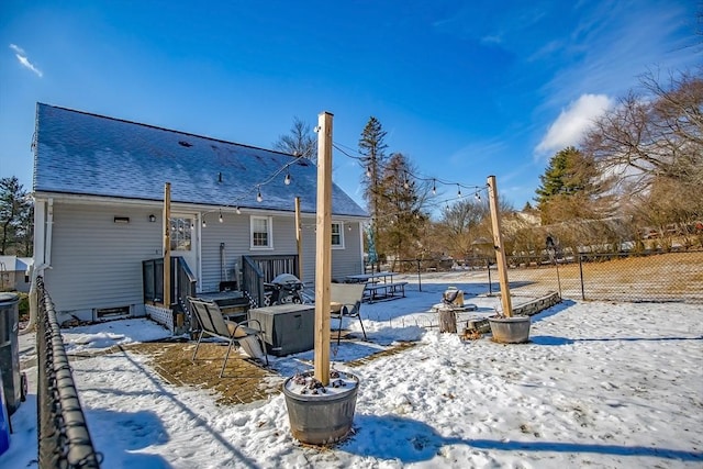 view of snow covered property