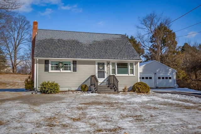 view of front of home featuring an outbuilding and a garage