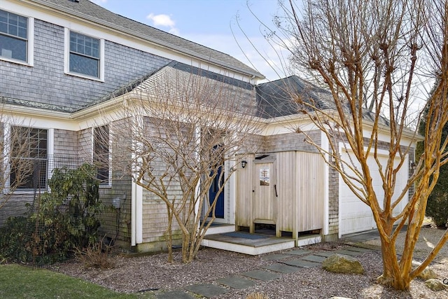 entrance to property featuring a garage