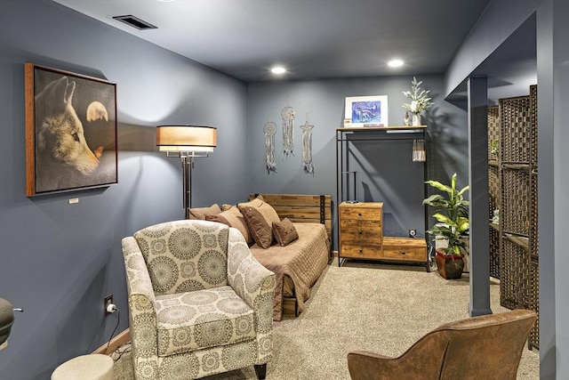 living area featuring carpet flooring