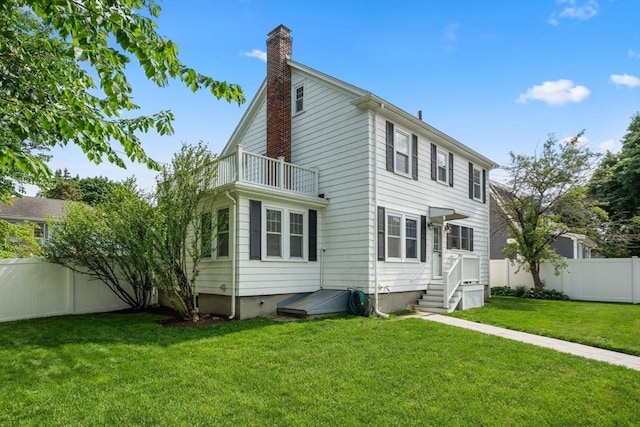 43 Chilton St, Belmont, MA 02478 - back of property with a balcony and a chimney