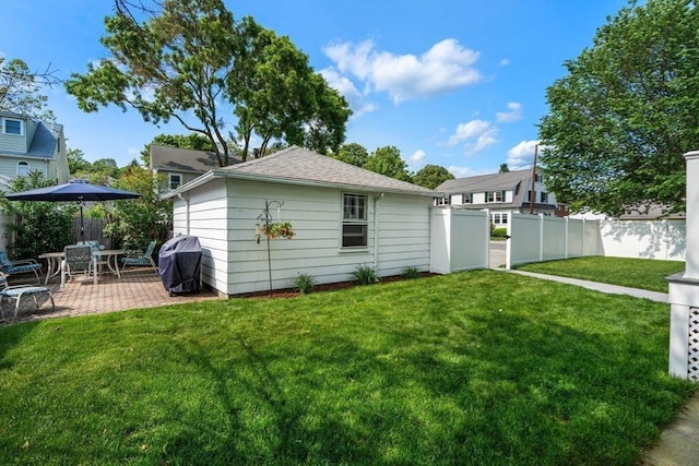 43 Chilton St, Belmont, MA 02478 - rear view of property featuring a patio area and a shingled roof