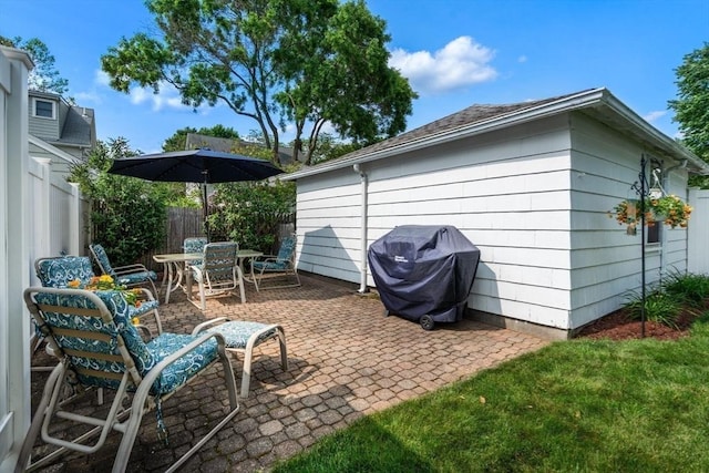 43 Chilton St, Belmont, MA 02478 - fenced backyard featuring a patio area, outdoor dining area, and area for grilling