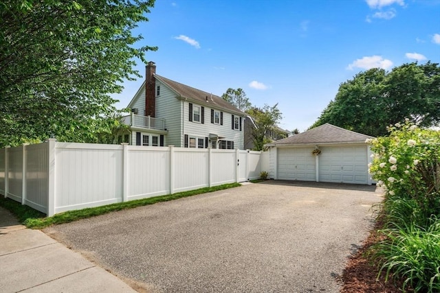 43 Chilton St, Belmont, MA 02478 - view of side of home featuring a garage and an outdoor structure