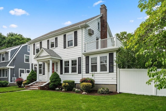 43 Chilton St, Belmont, MA 02478 - colonial house with a balcony, a chimney, and a wall mounted AC