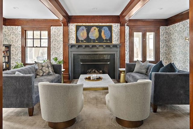 9 Prospect St, Winchester, MA 01890 - living room featuring a fireplace, beamed ceiling, crown molding, wallpapered walls, and carpet