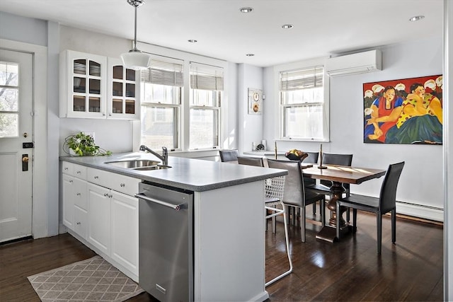 9 Prospect St, Winchester, MA 01890 - kitchen with a wall mounted AC, dishwasher, a sink, baseboard heating, and dark wood finished floors