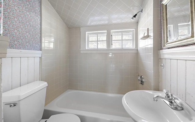 9 Prospect St, Winchester, MA 01890 - full bathroom with a sink, toilet, wainscoting, and shower / bath combination