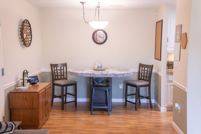 1610 Franklin Crossing Rd Unit 1610, Franklin, MA 02038 - dining room featuring light wood-style flooring, baseboards, and breakfast area