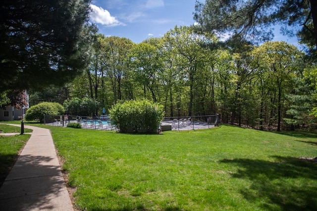 1610 Franklin Crossing Rd Unit 1610, Franklin, MA 02038 - view of yard with an outdoor pool