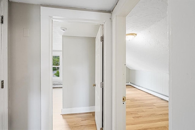 34 Worcester Rd, Charlton, MA 01507 - hall featuring baseboard heating, light wood finished floors, and baseboards
