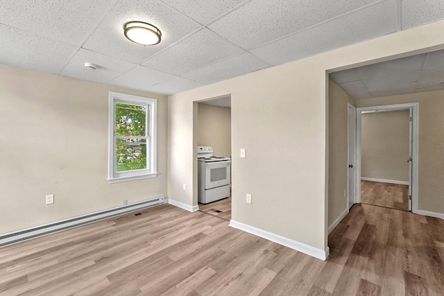 34 Worcester Rd, Charlton, MA 01507 - spare room with a paneled ceiling, a baseboard radiator, light wood-type flooring, baseboards, and a smoke detector