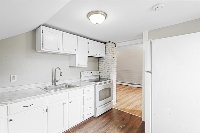 34 Worcester Rd, Charlton, MA 01507 - kitchen featuring white appliances, a sink, a baseboard heating unit, dark wood finished floors, and white cabinetry