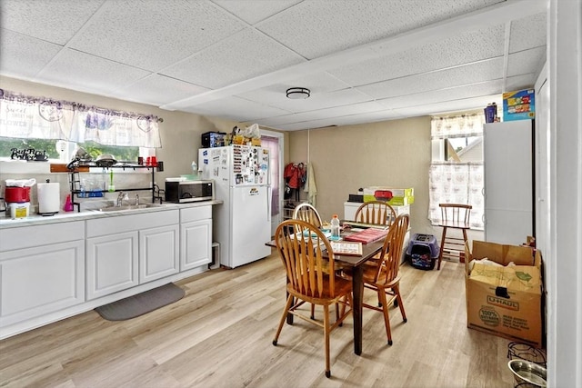 34 Worcester Rd, Charlton, MA 01507 - dining room featuring a paneled ceiling, light wood finished floors, and healthy amount of natural light