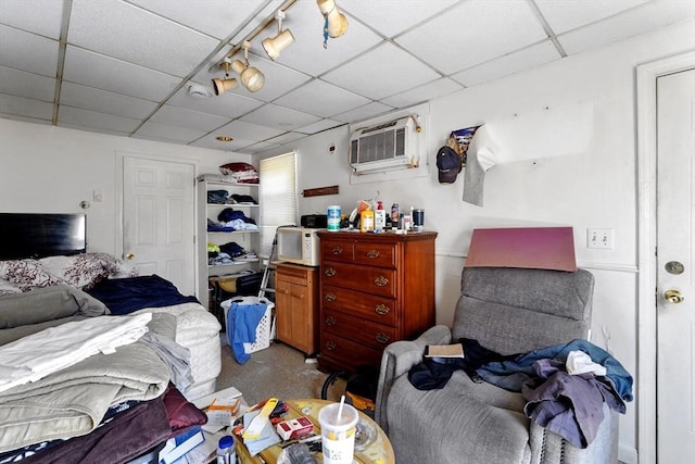 34 Worcester Rd, Charlton, MA 01507 - bedroom featuring a paneled ceiling, a wall unit AC, and carpet flooring