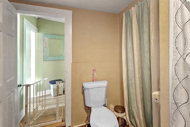 34 Worcester Rd, Charlton, MA 01507 - full bath with baseboards, toilet, and curtained shower