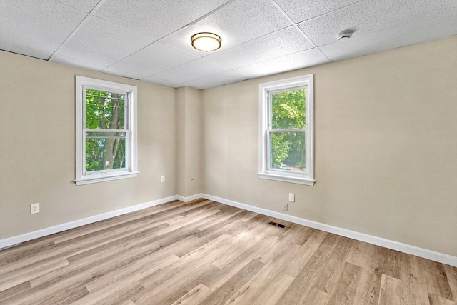 34 Worcester Rd, Charlton, MA 01507 - unfurnished room with light wood-type flooring, a paneled ceiling, plenty of natural light, and baseboards
