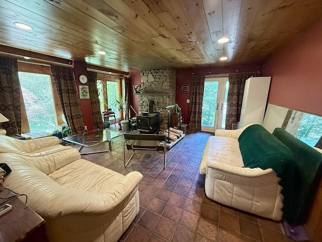 23 Partridge Hill Rd, Dudley, MA 01571 - living area with plenty of natural light, a wood stove, wood ceiling, and recessed lighting