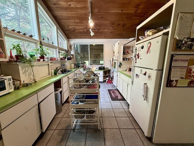 23 Partridge Hill Rd, Dudley, MA 01571 - kitchen featuring wood ceiling, white cabinetry, track lighting, white appliances, and vaulted ceiling