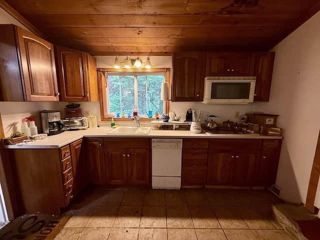 23 Partridge Hill Rd, Dudley, MA 01571 - kitchen featuring dishwasher, wooden ceiling, gas stovetop, light tile patterned floors, and light countertops