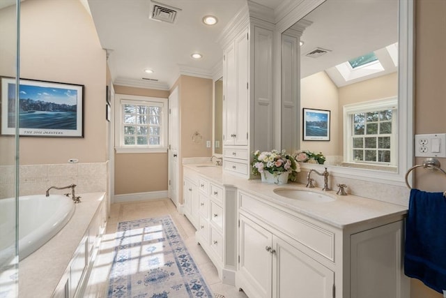 full bathroom with a sink, visible vents, a skylight, and tile patterned flooring