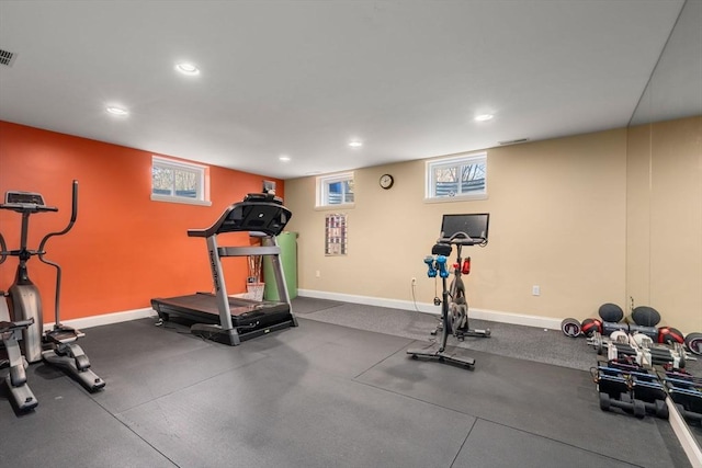 exercise room featuring recessed lighting, visible vents, and baseboards