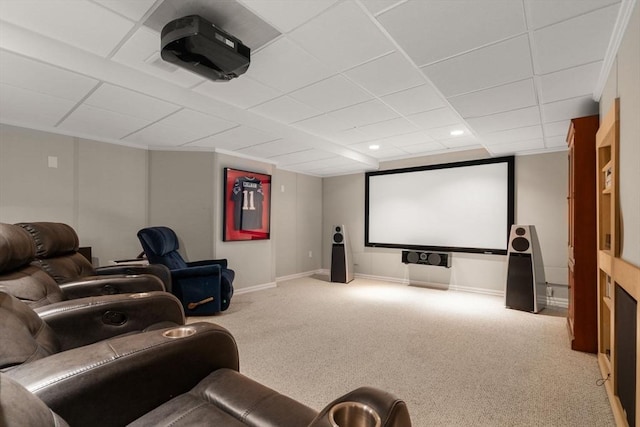 cinema with recessed lighting, a paneled ceiling, baseboards, and carpet floors