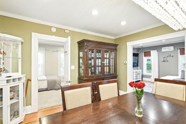 52 Harvard St, Chicopee, MA 01020 - dining room with wood finished floors, crown molding, recessed lighting, and baseboards