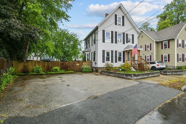 52 Harvard St, Chicopee, MA 01020 - view of front facade with a chimney
