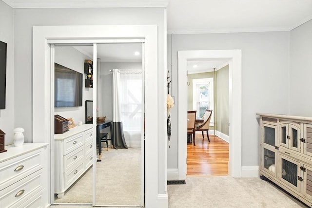 52 Harvard St, Chicopee, MA 01020 - hallway with light carpet, crown molding, baseboards, and recessed lighting