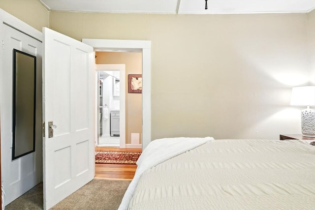 52 Harvard St, Chicopee, MA 01020 - bedroom with carpet floors and ensuite bath