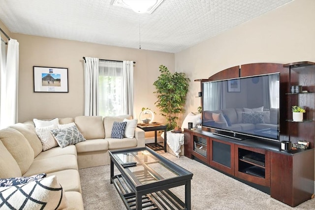 52 Harvard St, Chicopee, MA 01020 - living area with carpet and a textured ceiling