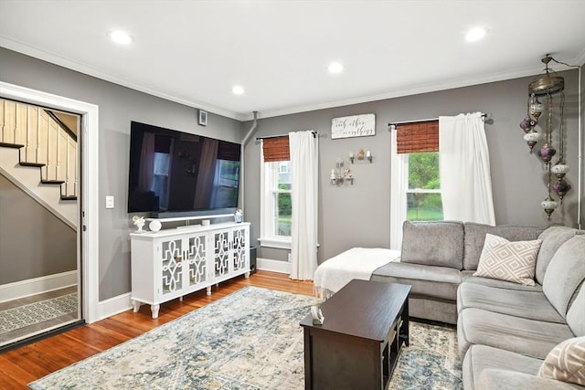 52 Harvard St, Chicopee, MA 01020 - living room featuring crown molding, stairs, wood finished floors, recessed lighting, and baseboards