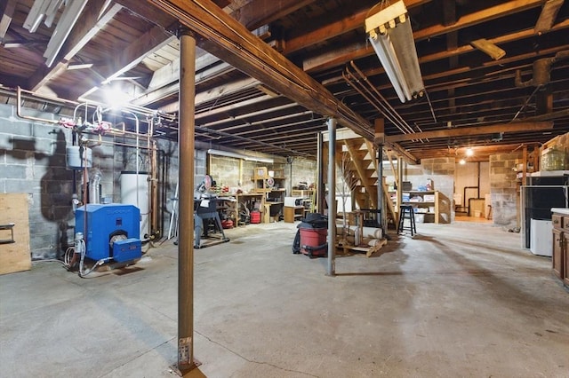 unfinished below grade area featuring gas water heater and a heating unit