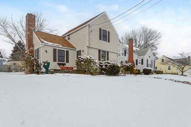 view of snow covered property