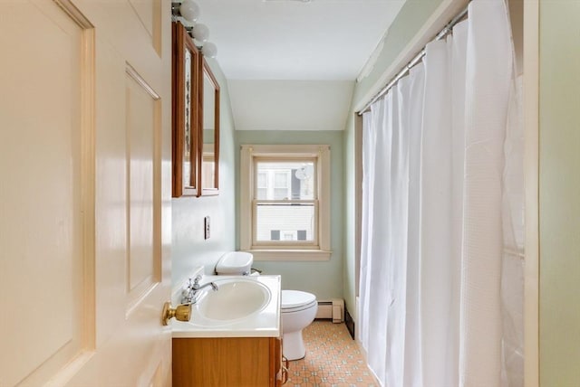 bathroom featuring a baseboard radiator, tile patterned floors, toilet, and vanity