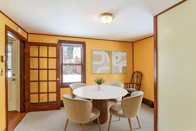 dining room with light hardwood / wood-style flooring