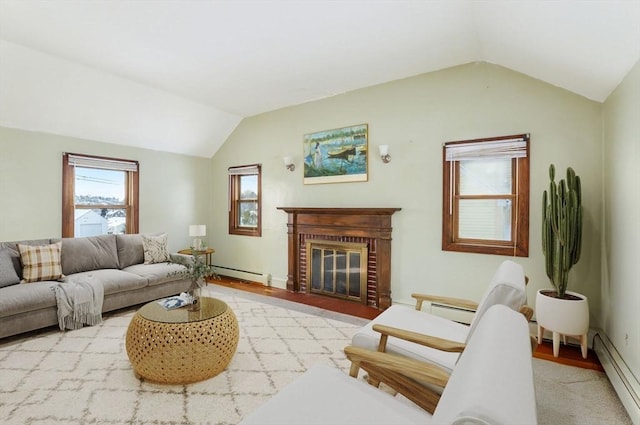 living room featuring a brick fireplace, baseboard heating, and vaulted ceiling