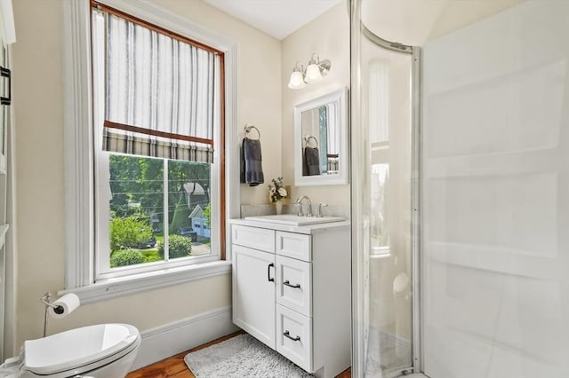 33 Grove St, Merrimac, MA 01860 - bathroom with vanity, a stall shower, and wood finished floors