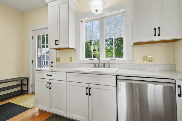 33 Grove St, Merrimac, MA 01860 - kitchen featuring dishwasher, white cabinets, light wood finished floors, and light stone countertops