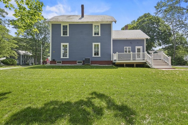 33 Grove St, Merrimac, MA 01860 - back of property with a wooden deck and a lawn