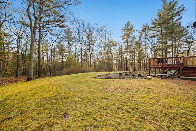 view of yard featuring a deck