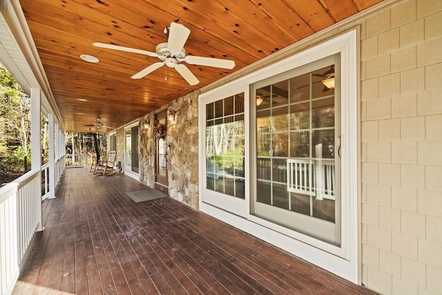 wooden terrace featuring a porch