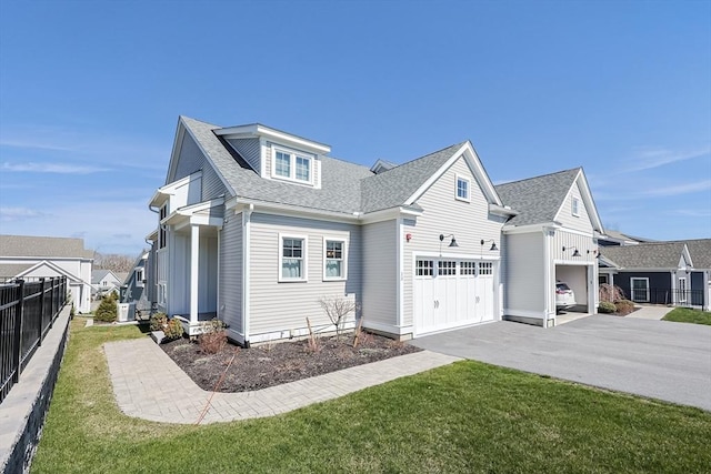 13 Birkdale Ln Unit 13, Hopkinton, MA 01748 - view of front of house with asphalt driveway, a shingled roof, and an attached garage