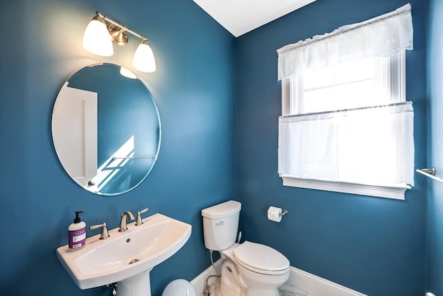 13 Birkdale Ln Unit 13, Hopkinton, MA 01748 - bathroom with a sink, toilet, baseboards, and marble look tile flooring