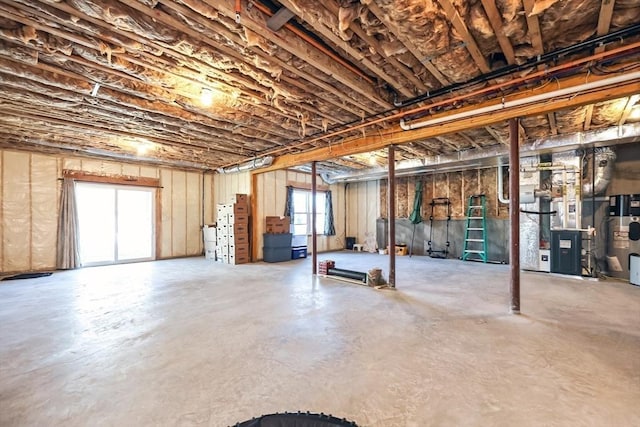 13 Birkdale Ln Unit 13, Hopkinton, MA 01748 - basement with electric water heater and heating unit