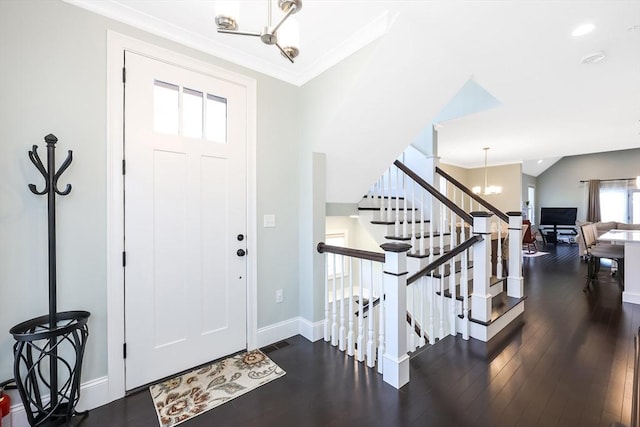 13 Birkdale Ln Unit 13, Hopkinton, MA 01748 - entrance foyer with a chandelier, baseboards, dark wood finished floors, ornamental molding, and stairs